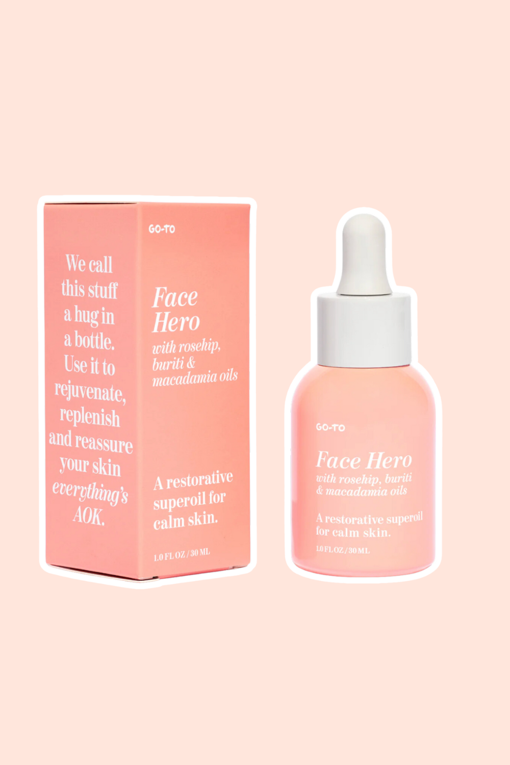 Go-To Skincare's Face Hero face oil on a peach coloured background.