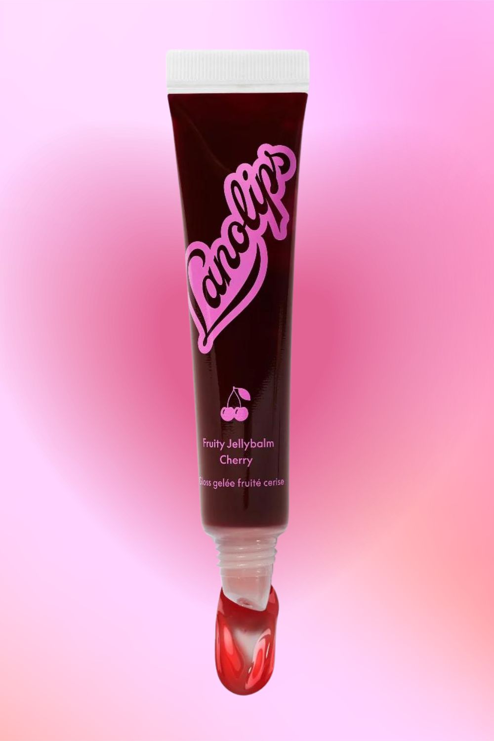 Lanolips Fruity Jellybalm Cherry tube on a pink gradient background with a droplet at the tip.